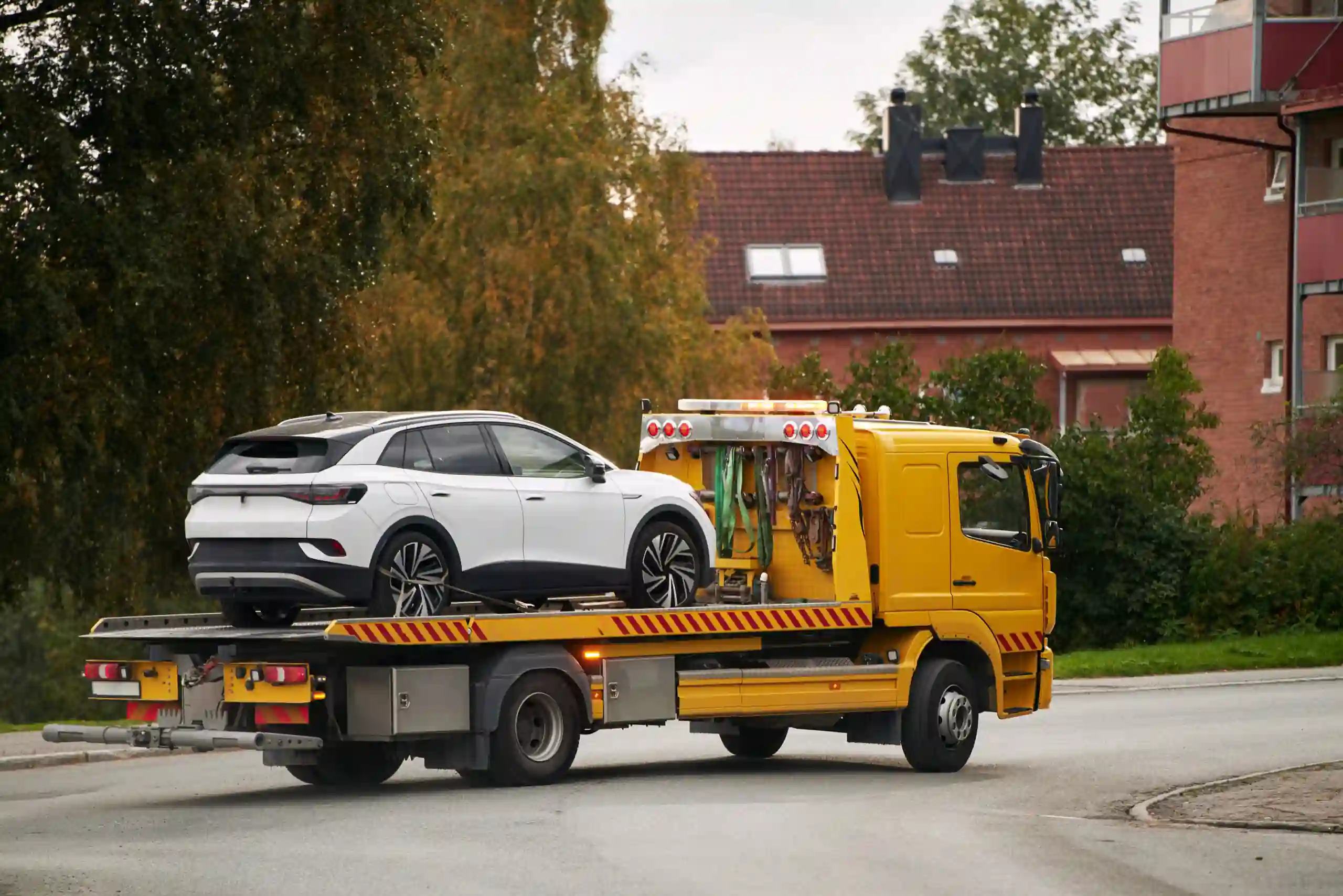 SUV secured on a flatbed truck
